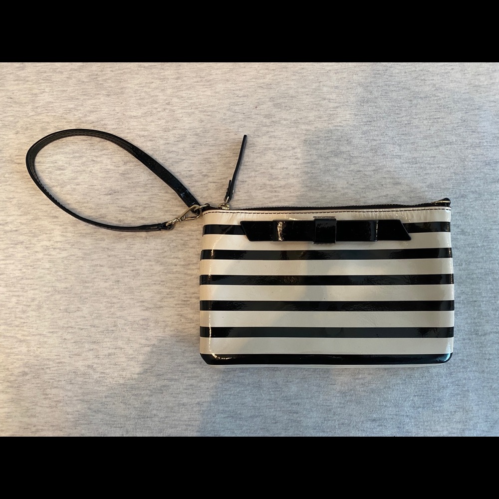 Kate Spade black and white striped bow wristlet